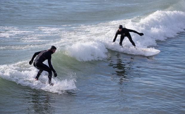 Bournemouth Echo: Along with the obvious at Beach Yoga Fest, there will also be a programme of water sports, among other attractions. Picture: PA
