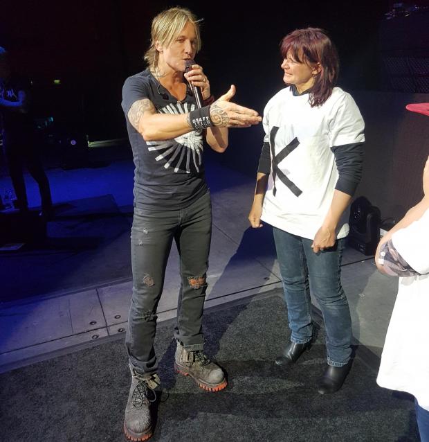 Bournemouth Echo: Keith Urban with Louise McCreanney during a concert at the BIC in Bournemouth