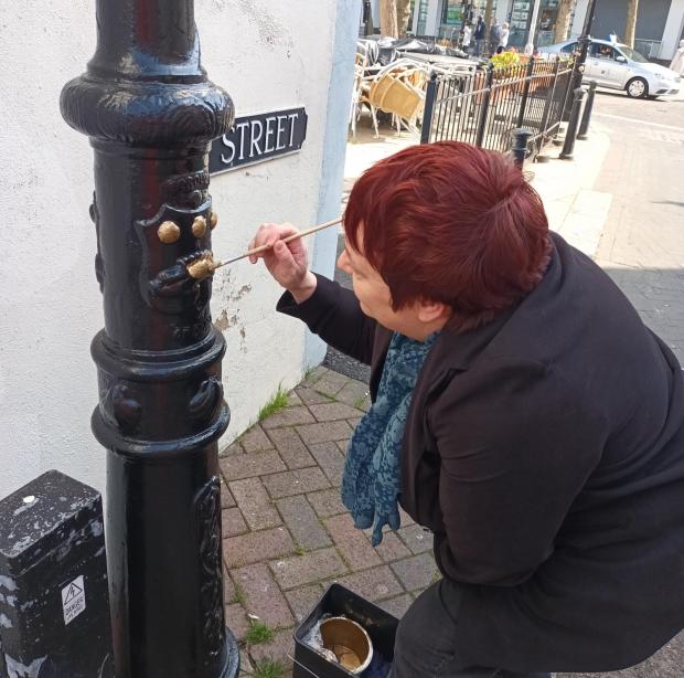 Bournemouth Echo: Historic lamp posts in Poole have been repainted. Picture: BCP Council