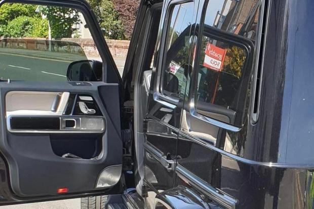 The Mercedes G-Wagen pulled over for its tinted windows
