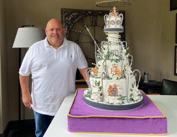 Bournemouth Echo: Mark with the finished cake - fit for royalty
