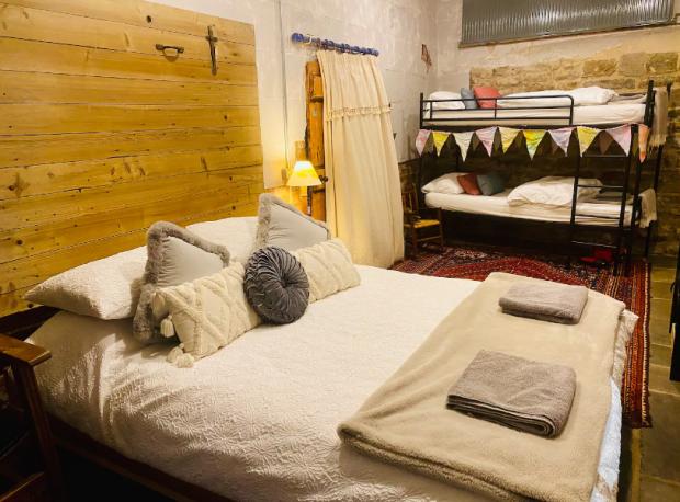 Bournemouth Echo: A look inside the bedroom at Basil's Place (Brittany Sparham // Instagram @onhorseback/Airbnb)
