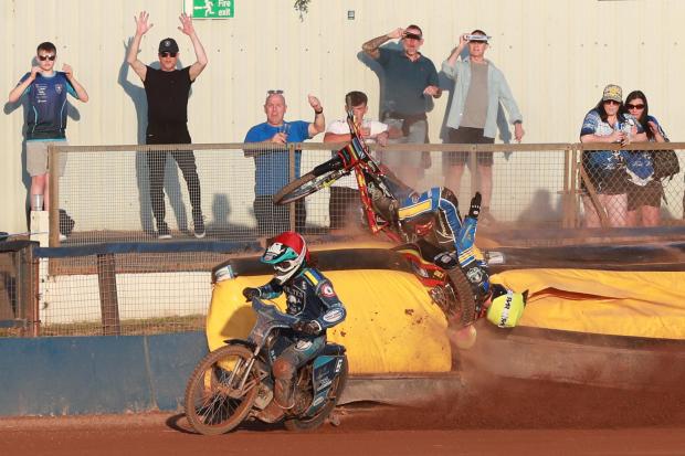 Poole Pirates  v Plymouth Gladiators in Championship Speedway at Wimborne Road. Michael Palm Toft crash against  Richard Lawson