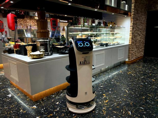 Bournemouth Echo: Robot waiter at COSMO