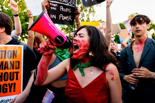 Anti-abortion protesters rally at the Supreme Court, Friday, June 24, 2022, in Washington