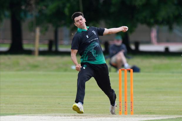 Bournemouth Echo: Brad Currie took 5-28 to help Dorset bowl Wales out for 181 Picture: GRAHAM HUNT
