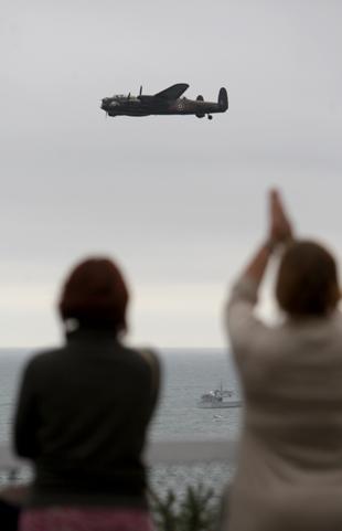 Applauding the Battle of Britain flypast. Picture Corin Messer.