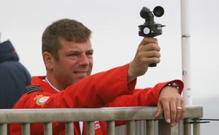 Graeme Bagnall from the Red Arrows checks the wind conditions before the display