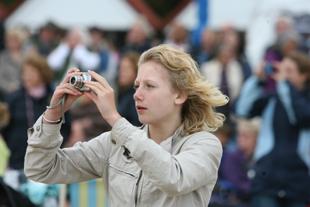 Bournemouth Air Festival 2010. Pic by Hattie Miles. A spectator taking a photograph.
