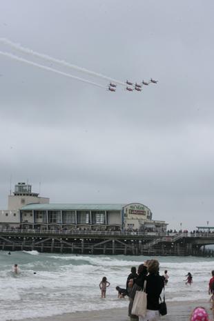 Bournemouth Air Festival 2010. Pic by Hattie Miles. Red Arrows over the Pier Theatre.