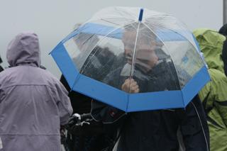 Pic Hattie Miles. Brolly and waterproofs on the East Cliff.