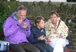 Pic Hattie Miles. Time for a yoghurt for Henry Williams, 10, and his parents, from Wimborne. 