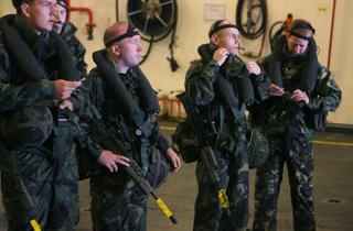 Bournemouth Air Festival Day Three - Day on RFA Largs Bay  -  Royal Marines prepare for their beach raid