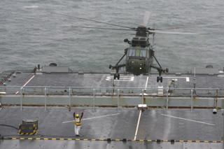 Bournemouth Air Festival Day Three - Day on RFA Largs Bay  -  A Sea King helicopter takes off from  the flight deck
