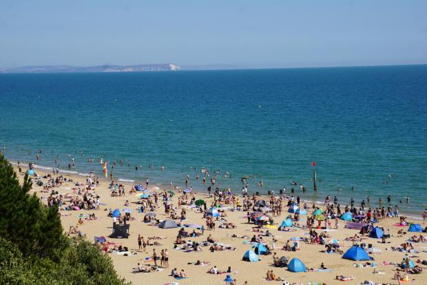 Bournemouth Echo: Sunbathers on Bournemouth beach during the heatwave last month 