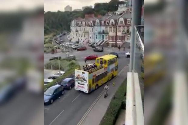 Bournemouth Echo: A Yellow Bus became stuck after drivers parked their cars on double yellow lines