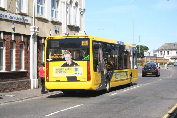 Bournemouth Echo: Carl on the back of a Yellow Buses some years ago