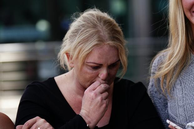 Bournemouth Echo: Archie's mother Hollie Dance surrounded by family and friends, outside the Royal London hospital in Whitechapel, east London, speaking to media following the death of her 12 year old son Archie Battersbee. (Aaron Chown/PA wire/PA images)
