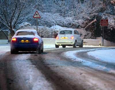 Bournemouth wakes up to several inches of snow. The scene at Boscombe Spa Road. Picture by Corin Messer.