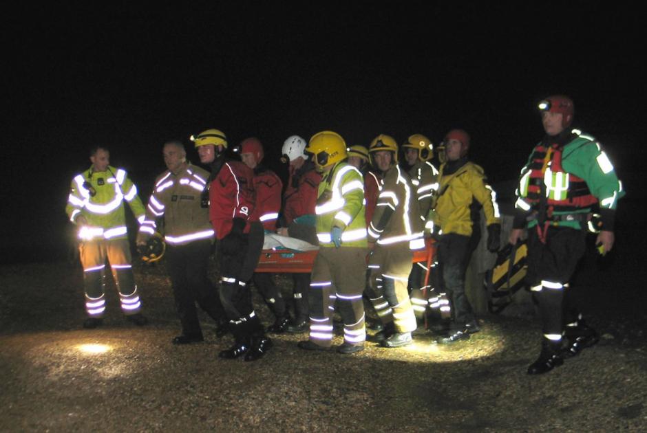 A woman lying helpless in the countryside saved by firefighters