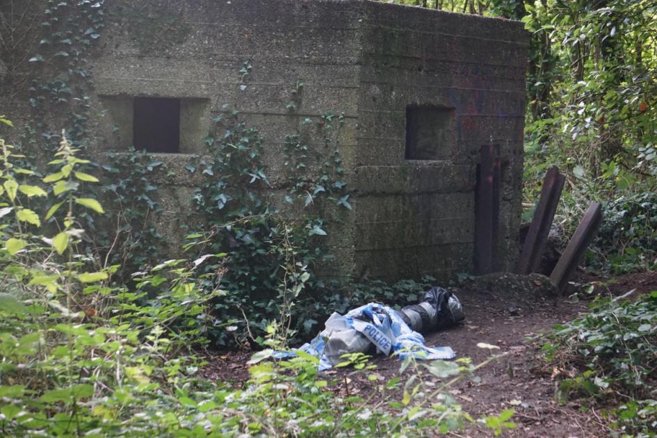 Woodland cordoned off and forensics called to hidden bunker