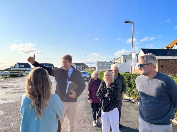 Bournemouth Echo: Tobias Ellwood speaking with residents in the Southbourne Crossroads car park Bournemouth Echo: Tobias Ellwood speaking with residents in the Southbourne Crossroads car park