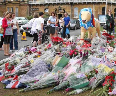 The mass of floral and other tributes to Red Arrows Pilot Fl Lt Jon Egging
