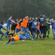 Christchurch FC celebrate reaching the third qualifying round of the FA Cup for the first time in the club’s history
