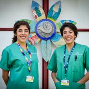 Identical twins Samar and Samah Aweis, junior doctors at Royal Bournemouth Hospital - photo by Andy Scaysbrook, part of the Unmasked exhibition.
