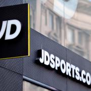 A shop sign for JD Sports in central London. Credit:PA