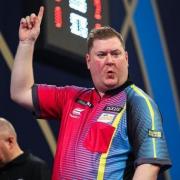 Ricky Evans celebrates after winning a set during day two of the William Hill World Darts Championship at Alexandra Palace, London. Picture date: Thursday December 16, 2021.
