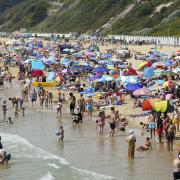 People enjoying Bournemouth beach on Tuesday, July 19 (PA)