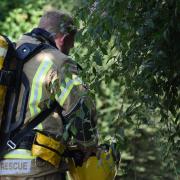 fireman tackling chemical spill