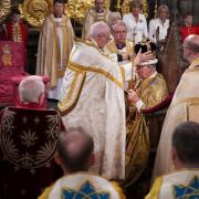 King Charles III is crowned with St Edward's Crown by The Archbishop of Canterbury the Most Reverend Justin Welby