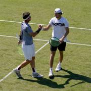 Toby Samuel, right, clinched a shock win on his Wimbledon debut