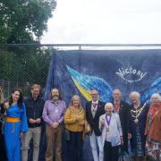 Tobias Ellwood MP,  Cllr George Farquhar, Cllr Lesley Dedman, Cllr Duncan Sowry-House, Cllr Kate Wheller, Cllr Tony Trent, Cllr Cllr Vivienne Charett and Parks Foundation chief executive Cathi Farrer with organisers of the Ukraine independence day event.