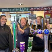 Rowena Jones (middle) has taken the mantle and Ferndown's town pub with her husband Jay.