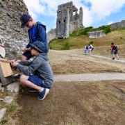 Children enjoying a quest at Corfe Castle