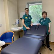 Lenka and Kay from Complementary Therapies team with the chair-bed.