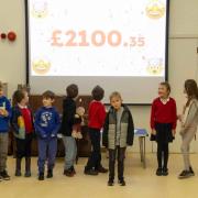 The ‘big reveal’ when pupils at Pamphill First School learned how much they’d raised