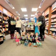 (Left to right) Lisa Esposito, Laura Gilbert, and Warren Glynn invited the children of Chewton Common Playgroup to Bookends for World Book Day.