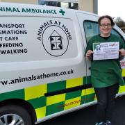 Charlotte by her pet ambulance