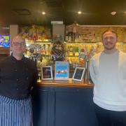Head chef Edward and general manager Jack, in front of their 3ft chocolate easter egg