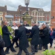 Carrying the coffin to the funeral
