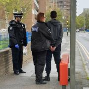 Poole police arresting a man