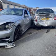 Driver smashes into parked cars after alleged police chase