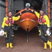 Mudeford RNLI volunteer Helms, L to R, Justin O'Connell and Pete Dadds