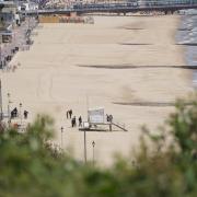 Teen released without charge after woman stabbed on beach