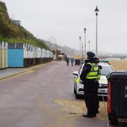 The county force received a report at 11.42pm on Friday 24 May 2024 that two people had been stabbed on Durley Chine Beach.
