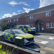 Man arrested after woman assaulted at address in Bournemouth